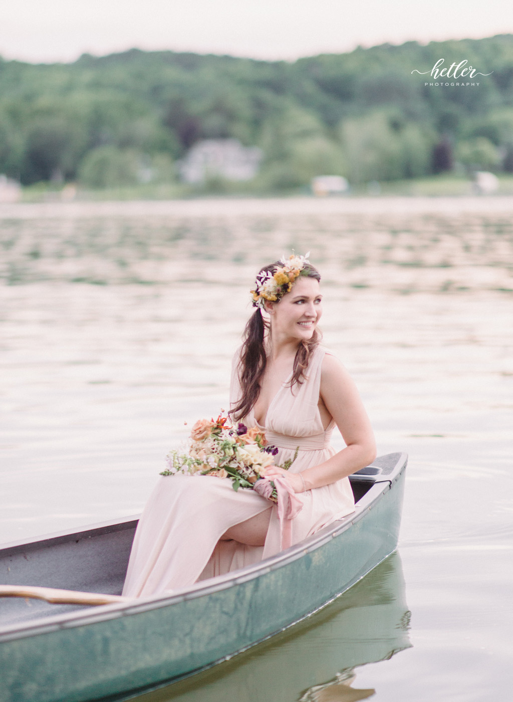 Northern MIchigan lakeside wedding inspiration boho picnic theme in canoe