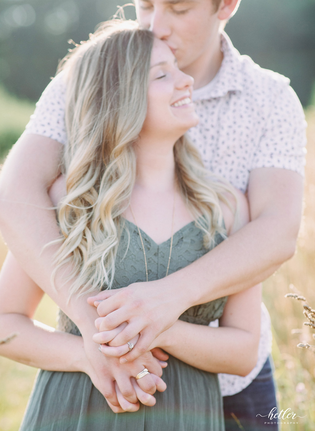 Grand Rapids engagement pics in a field of wildflowers