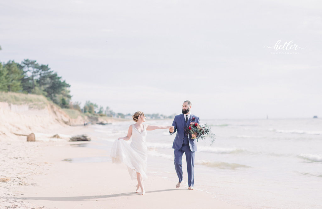 Grand Haven Holiday Inn wedding with Lake Michigan beach wedding portraits
