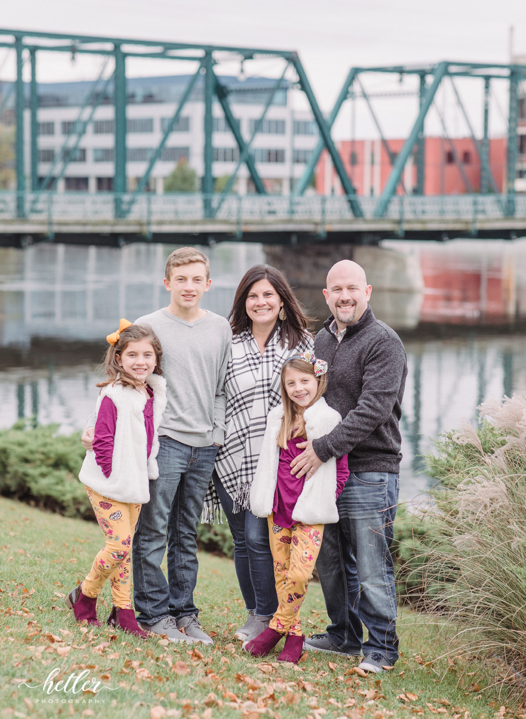 Downtown Grand Rapids fall family photos in front of the Sixth Street Bridge