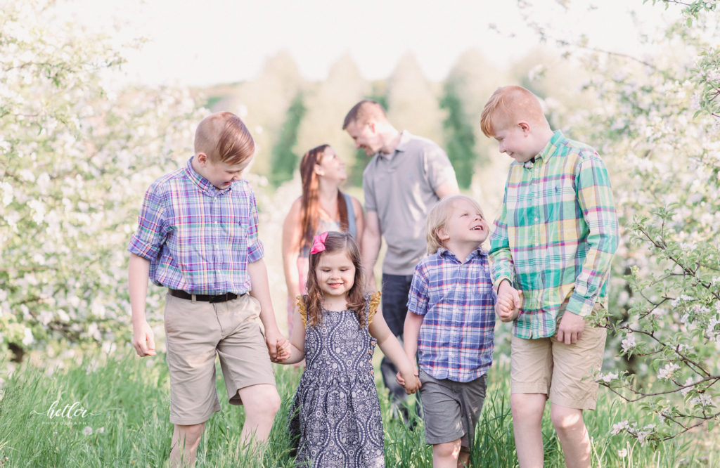 Grand Rapids, Michigan family photos at an apple orchard with apple blossoms