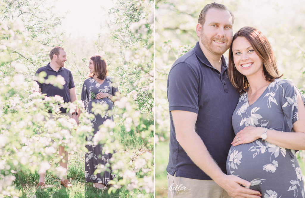Grand Rapids maternity photos with a rainbow baby in apple blossoms