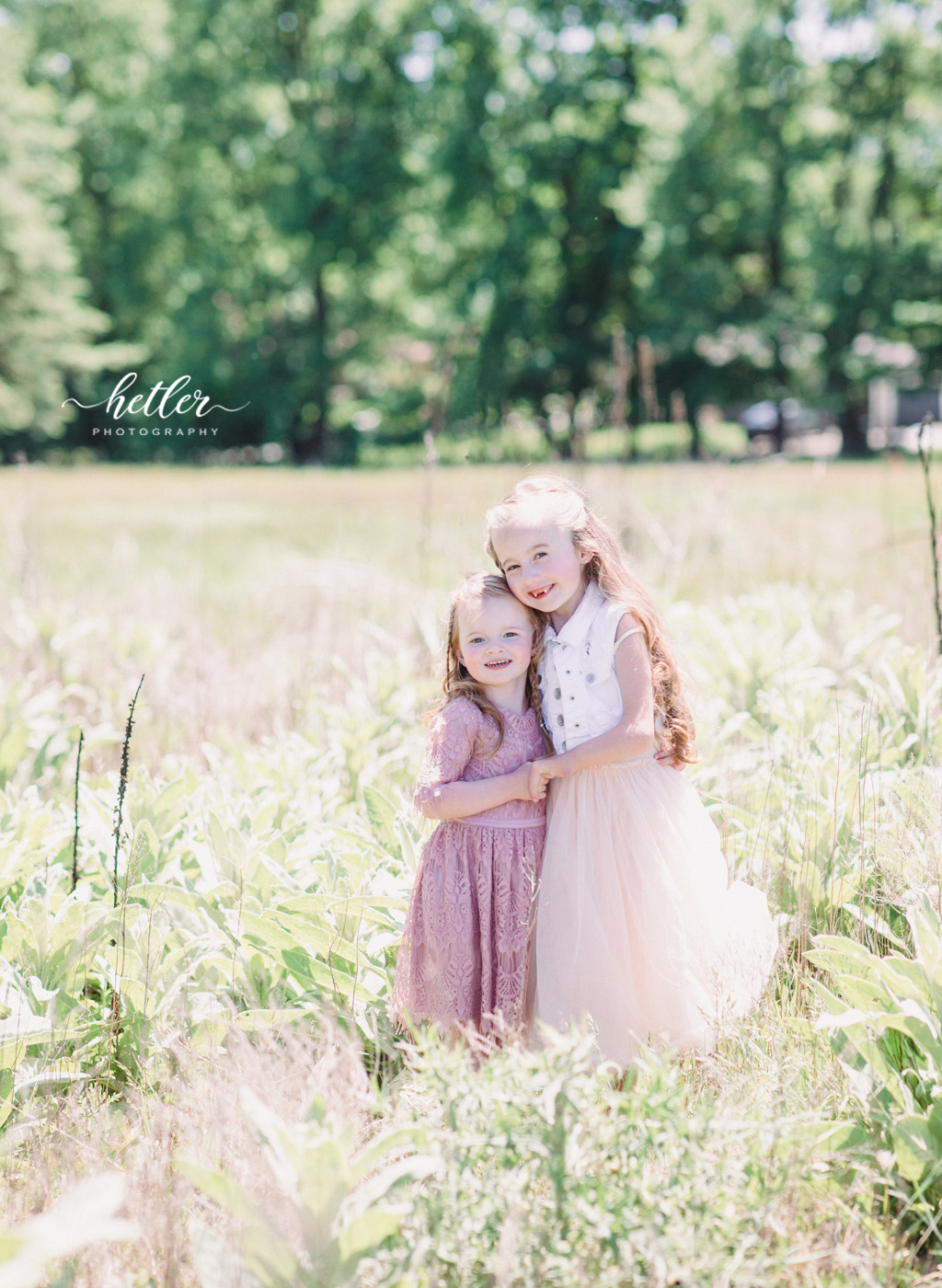 Family photos in Grand Rapids, Michigan at The Higlands with a beautiful girl with two lucky fins