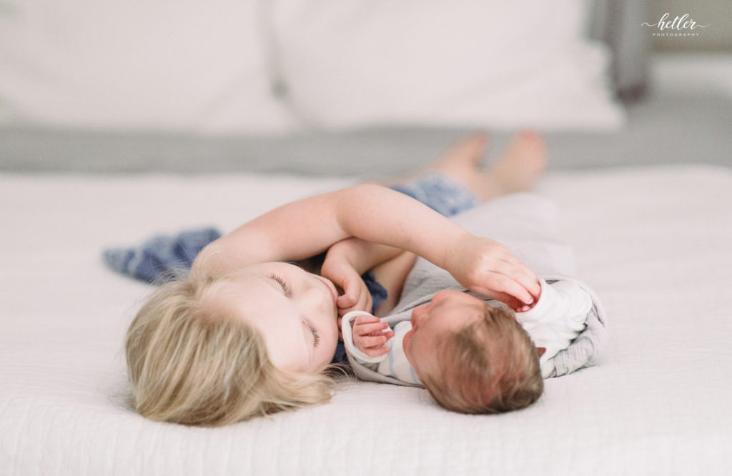 Cascade Michigan in-home newborn photography session for a sweet baby boy