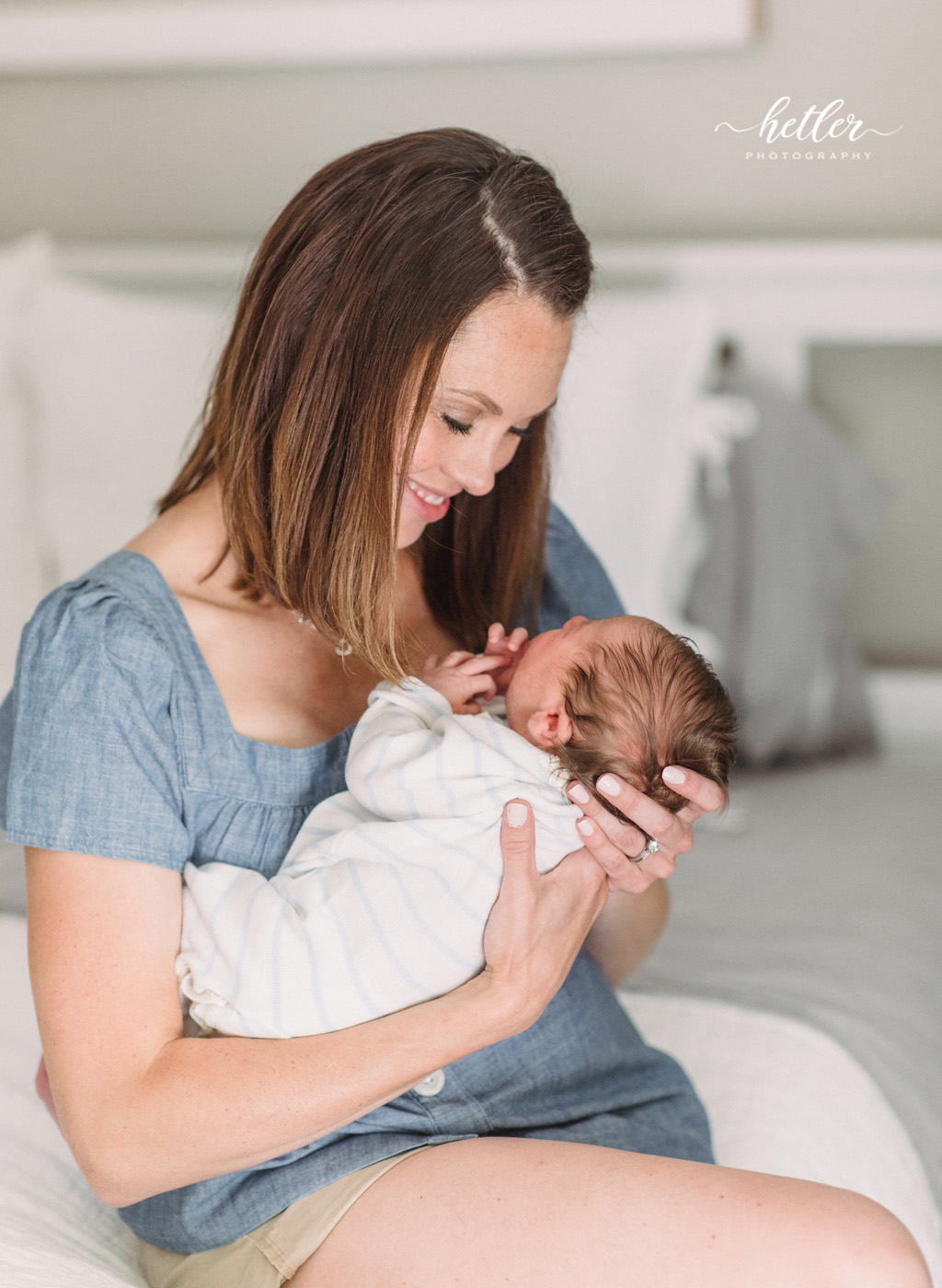 Cascade Michigan in-home newborn photography session for a sweet baby boy