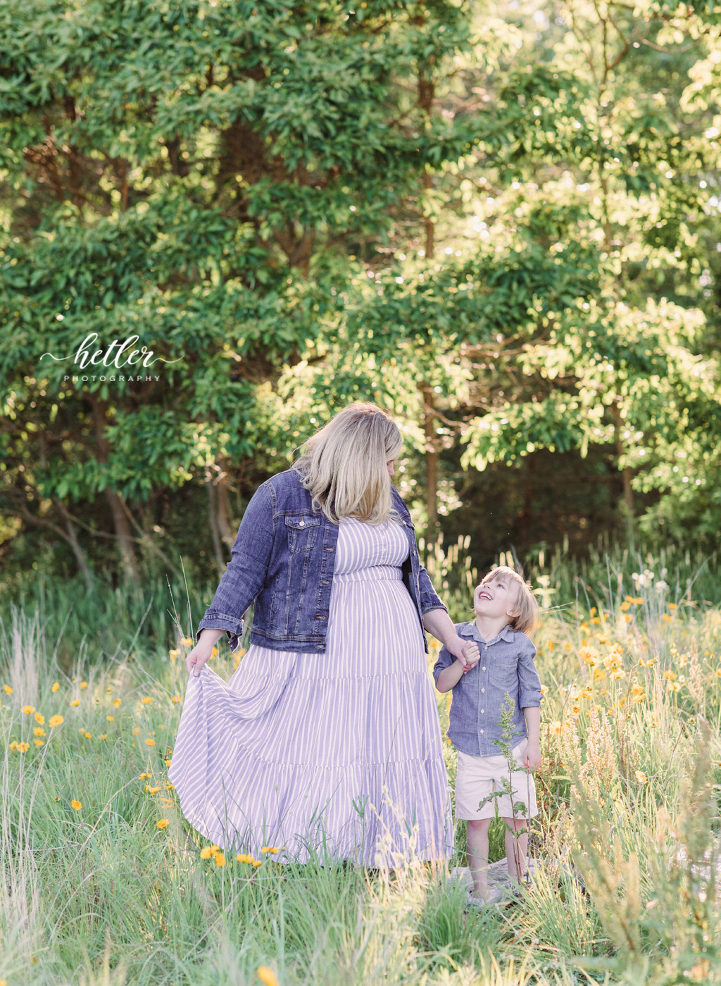 Fremont Michigan family photos in a field of yellow wildflowers