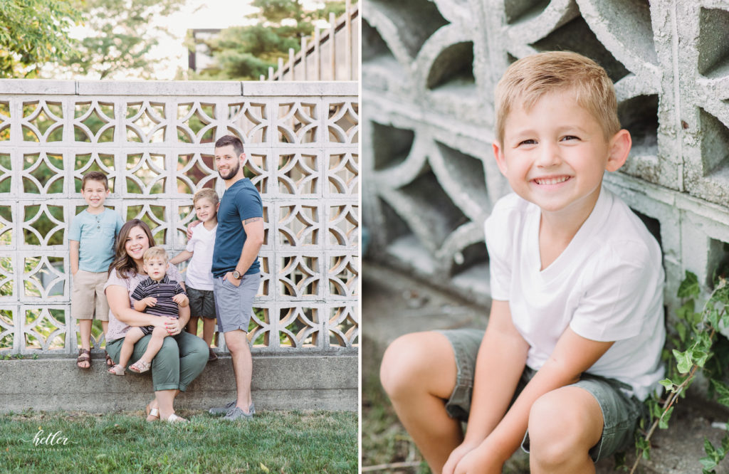 Downtown Grand Rapids family pics on a parking garage rooftop with views of the city and with a white breeze block wall