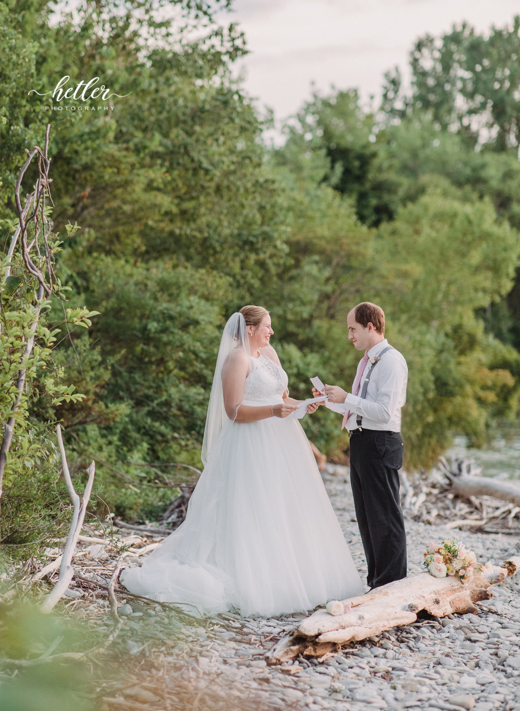 Petoskey wedding photos to celebrate a rescheduled wedding due to Covid with a gorgeous sunset