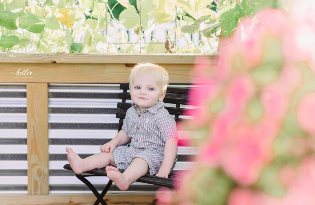 Sparta Michigan summer mini sessions in a backyard with a garden and clothesline theme