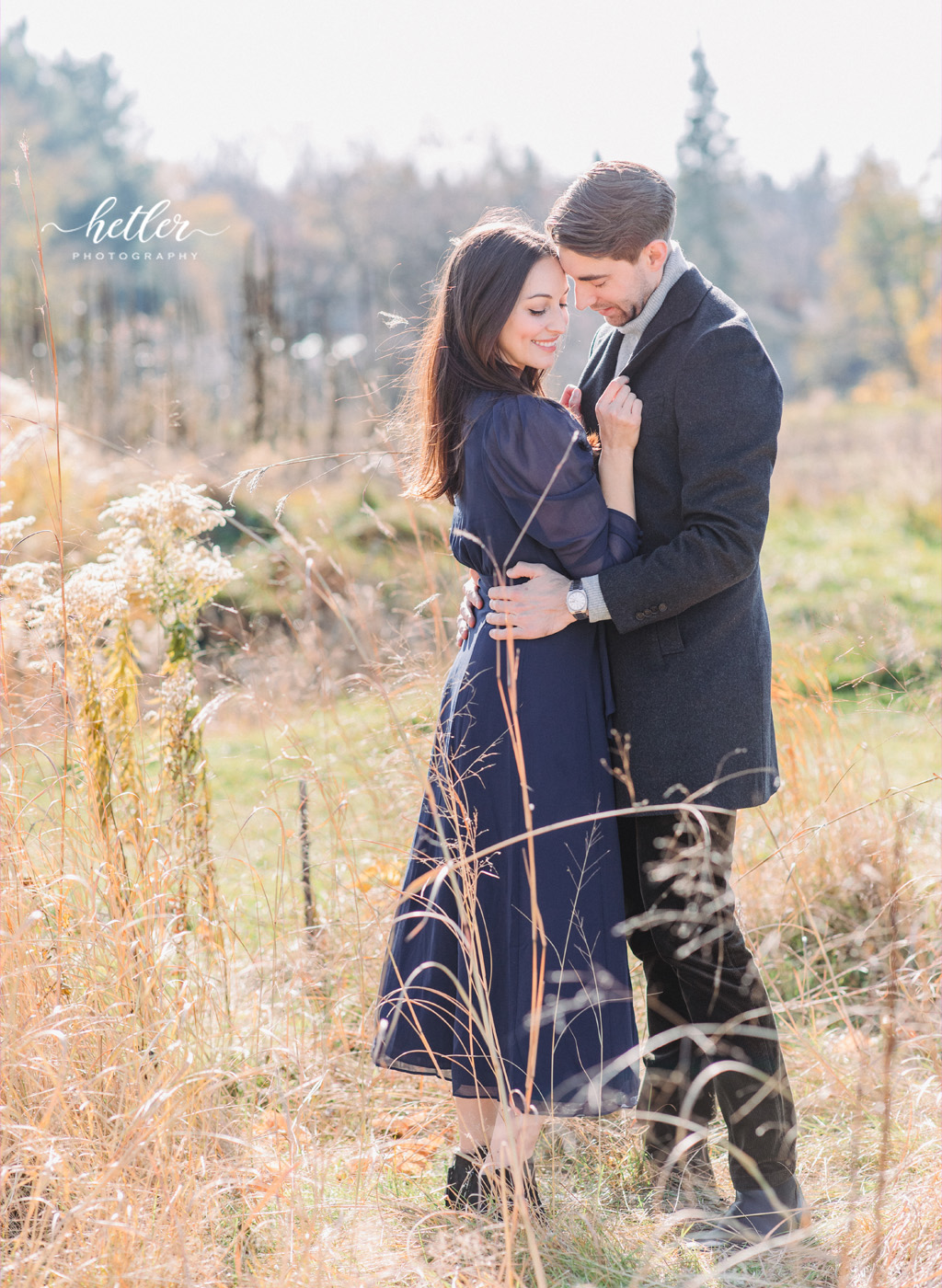 Couple photo session at The Highlands in Grand Rapids on a sunny fall day with the couple's Goldendoodle