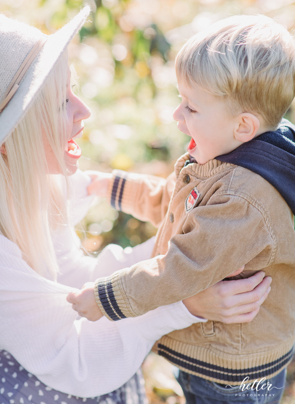 Fall mom and son photo session at Grange Fruit Farm in Rockford Michigan