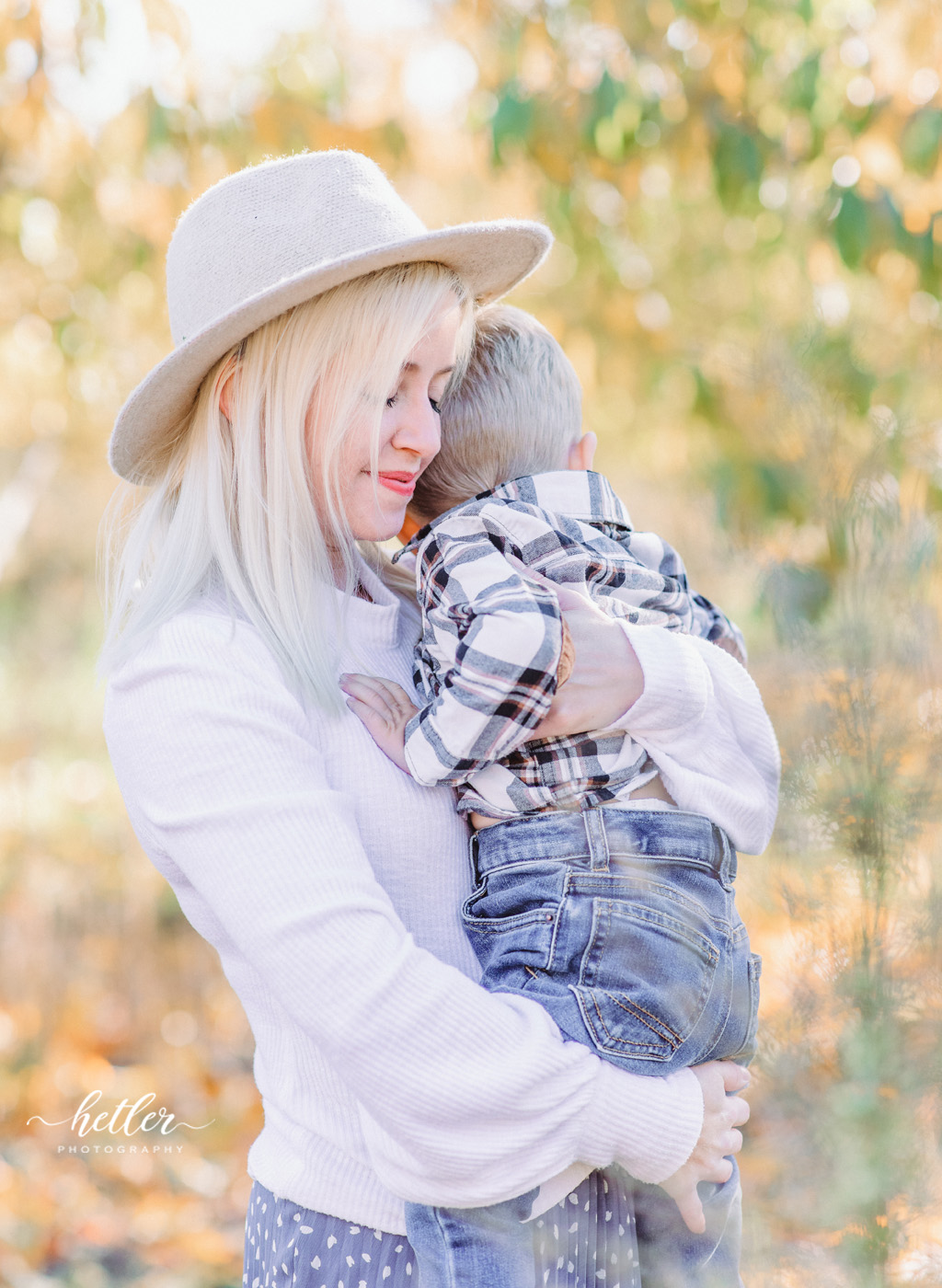 Fall mom and son photo session at Grange Fruit Farm in Rockford Michigan