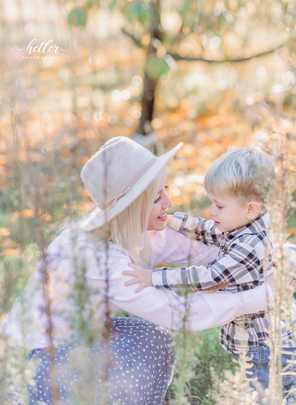 Fall mom and son photo session at Grange Fruit Farm in Rockford Michigan