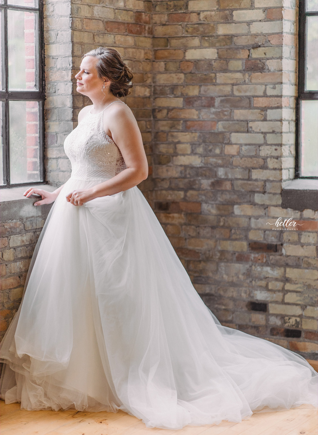 Spring warehouse wedding in downtown Grand Rapids Michigan at Studio D2D with dusty rose and navy colors
