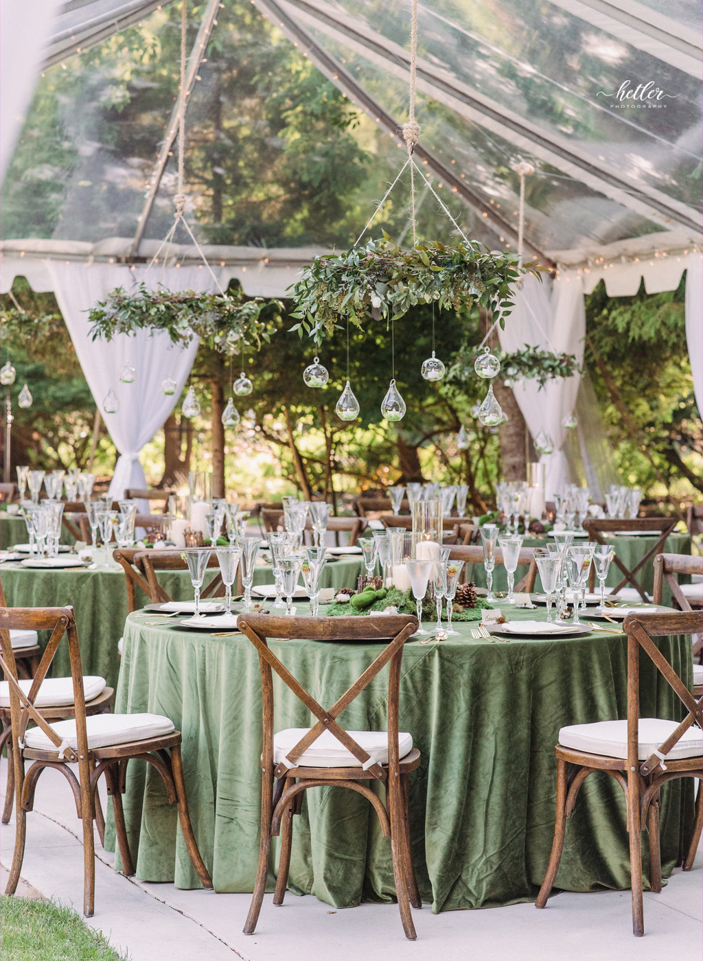 Saugatuck Michigan woodland themed backyard summer wedding with a beautiful clear tent
