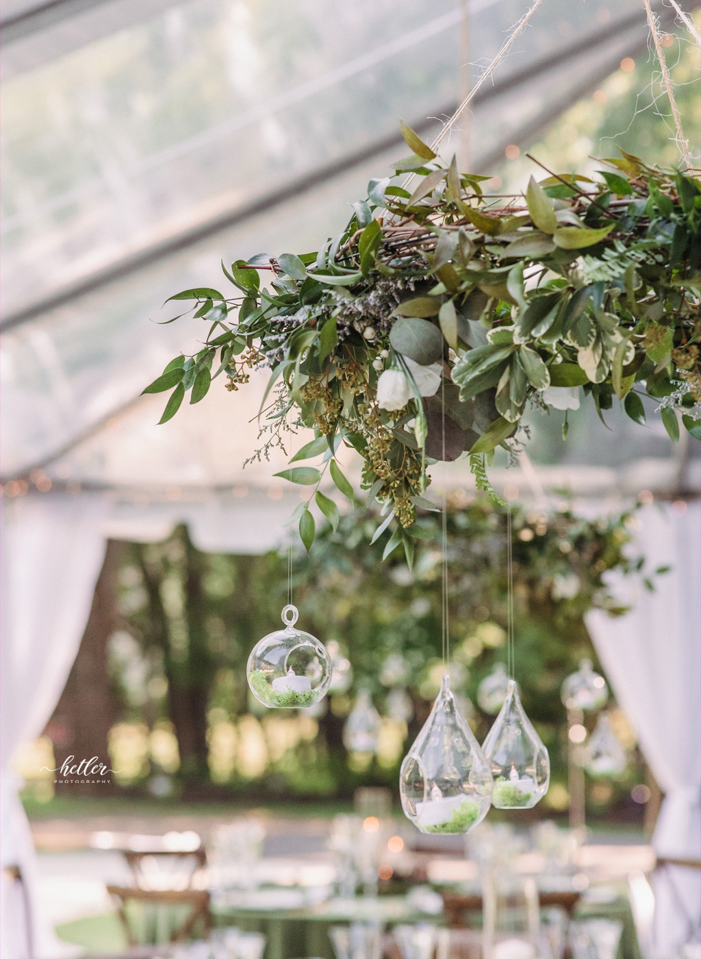 Saugatuck Michigan woodland themed backyard summer wedding with a beautiful clear tent