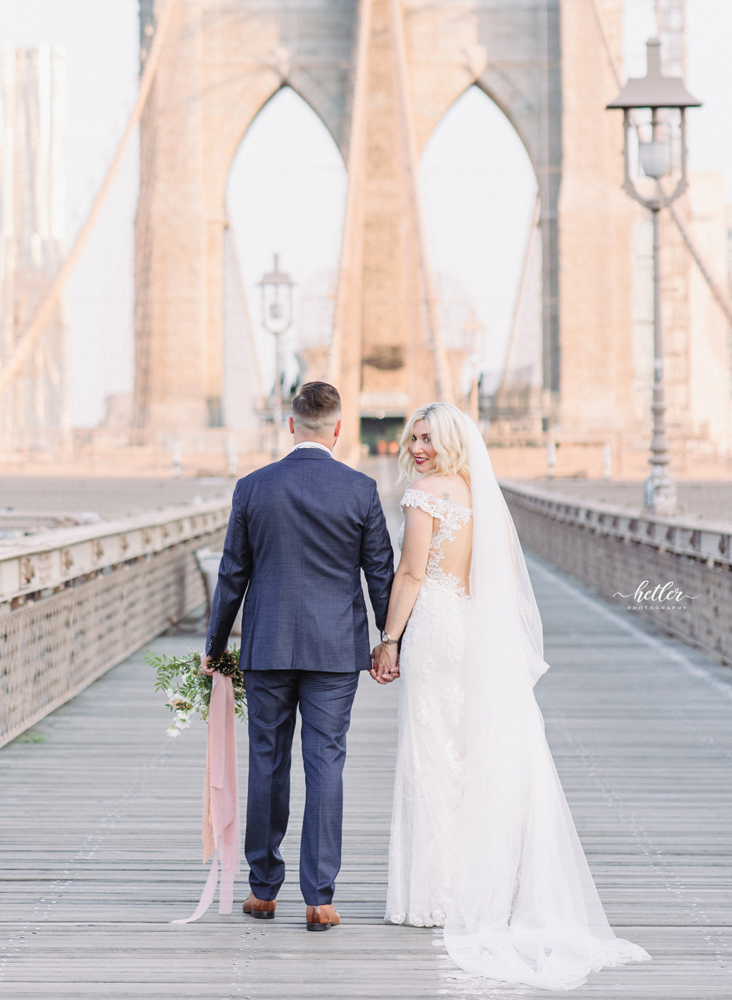 New York City wedding photos at The Brooklyn Bridge at sunrise