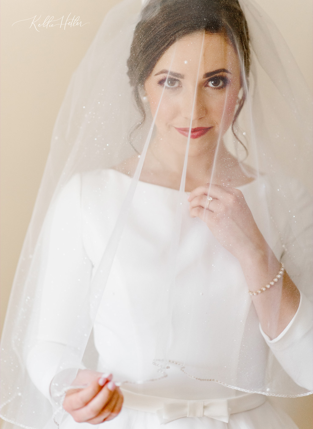 bride under cathedral veil in detroit