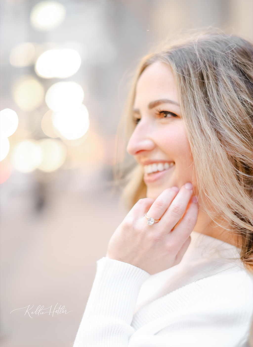 Engagement photos of bride to be featuring diamond ring