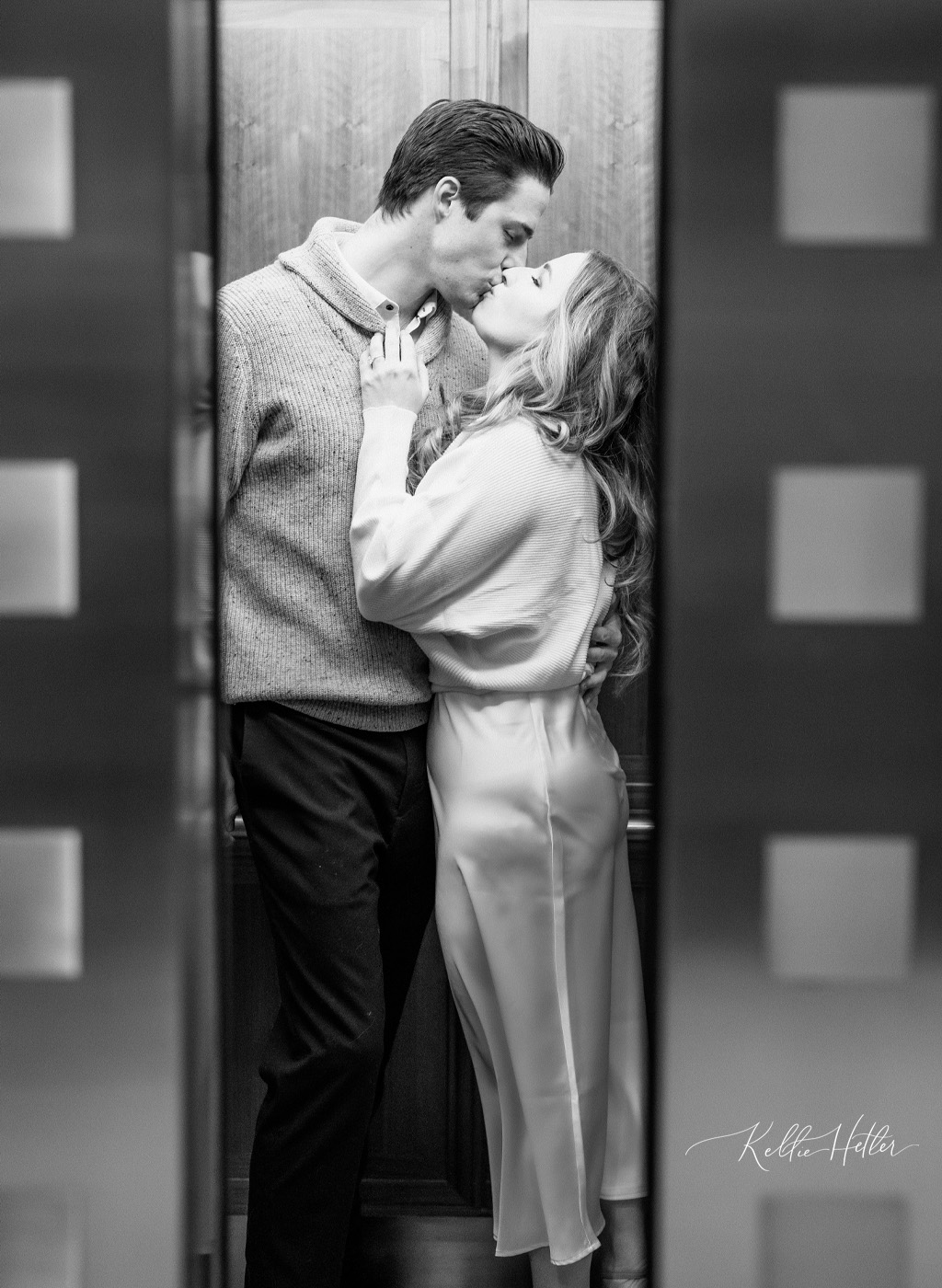 engagement photo in a closing elevator