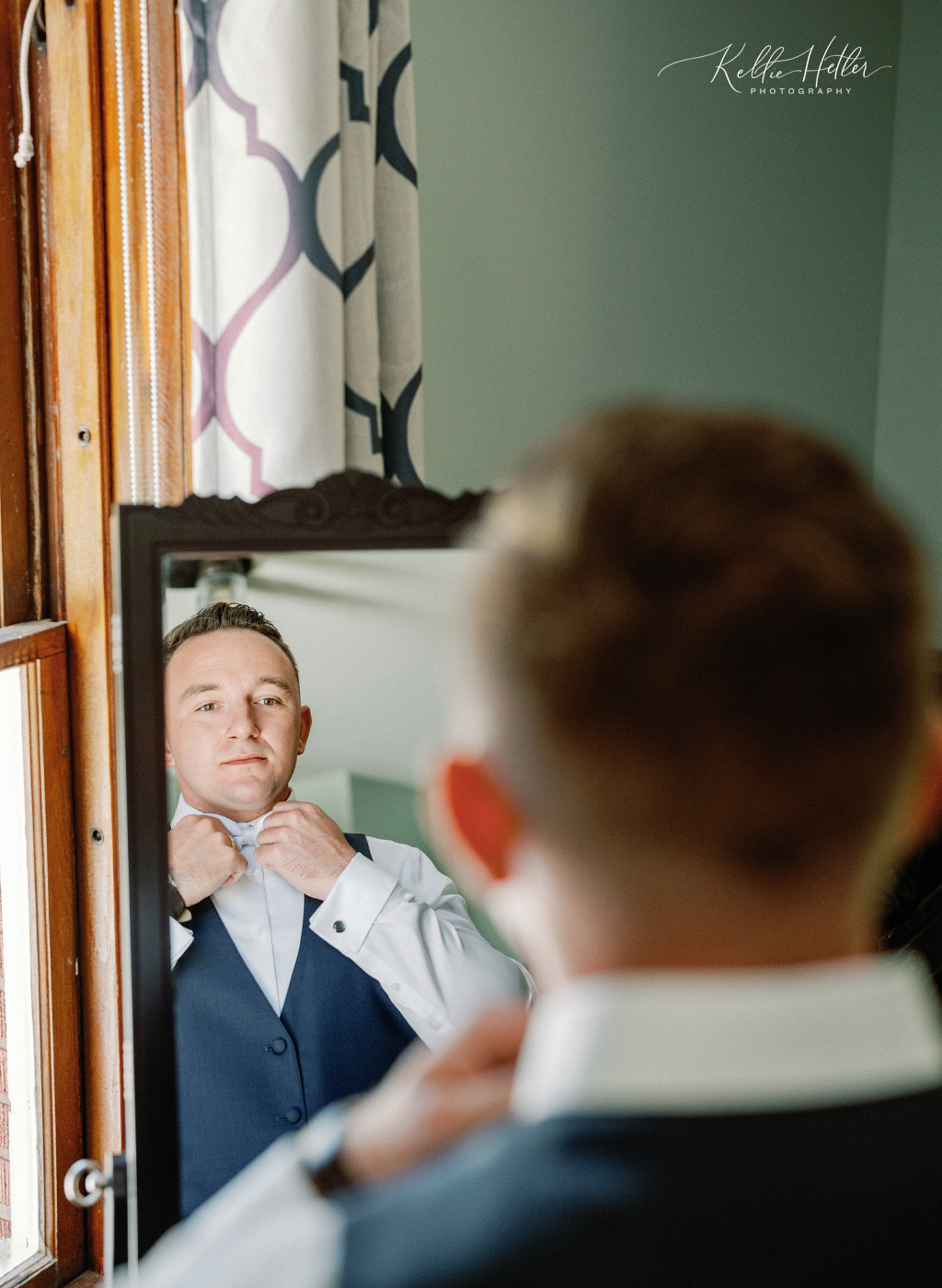 groom in carriage house at felt estate